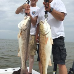 Pro Cure - Steve and Phil with some beautiful redfish.
