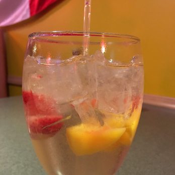 Fiesta Ranchera Mexican - My favorite white peach sangria. - Mexican Near Me - Adrian, Michigan