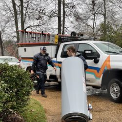 Environment Masters - Rolling in with a new tank install on a rainy day.