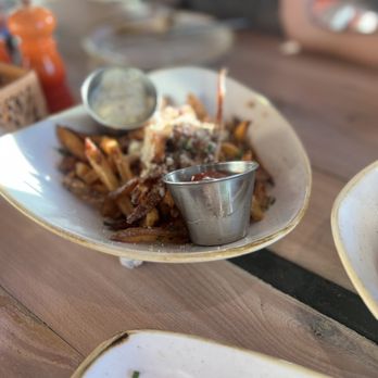 Monkeypod Kitchen - Garlic Truffle Oil Fries - amazing! - Hawaiian Near Me - Kapolei, Hawaii Monkeypod Kitchen - Garlic Truffle Oil Fries - amazing! - Hawaiian Near Me - Kapolei, Hawaii