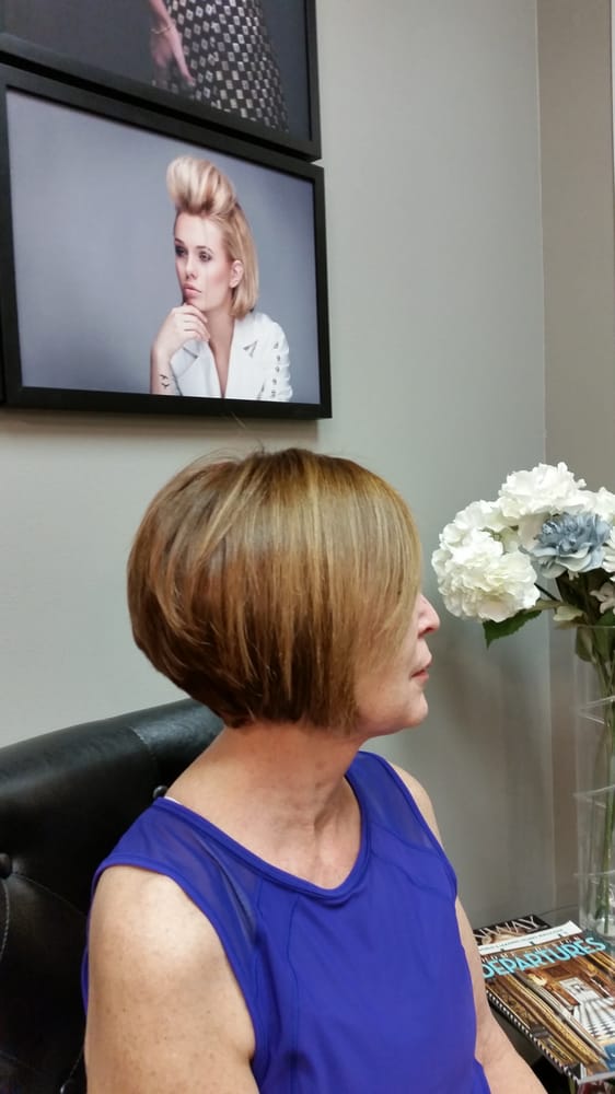 Rene Russak Hair Boutique Logo