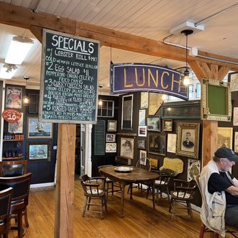 Lunch Bar Harbor - a man sitting at a table - Sandwiches Near Me - Bar Harbor, Maine Lunch Bar Harbor - a man sitting at a table - Sandwiches Near Me - Bar Harbor, Maine