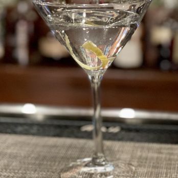 Sonny Lubick Steakhouse - a martini glass on a table - Steakhouses Near Me - Fort Collins, Colorado
