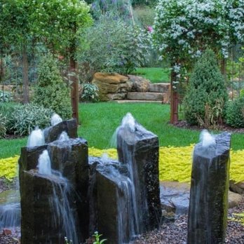 Williamson’s Water and Woods - a fountain in a garden - Home Services Near Me Williamson’s Water and Woods - a fountain in a garden - Home Services Near Me