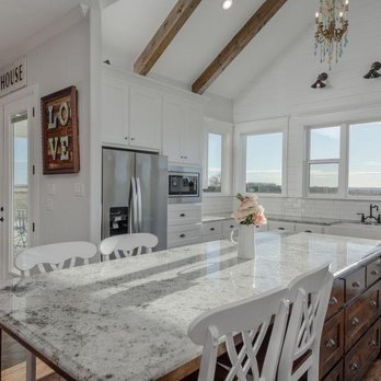 Johnson Home Remodeling - a kitchen with a large island - General Contractors Near Me - Hayward, California Johnson Home Remodeling - a kitchen with a large island - General Contractors Near Me - Hayward, California