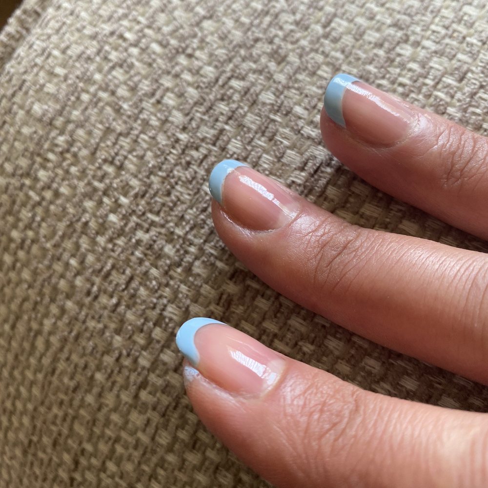 It's like I did my nails at home. Didn't even bother to lean the nail polish on the skin around the nails It's like I did my nails at home. Didn't even bother to lean the nail polish on the skin around the nails