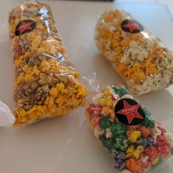 Poparazzi's Gourmet Popcorn - Fruit Loop popcorn. Hot wing and ranch popcorn. Spicy cheese and cashew caramel popcorn