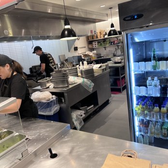 Chipotle Mexican Grill - a woman preparing food - Mexican Near Me - Morris Plains, New Jersey Chipotle Mexican Grill - a woman preparing food - Mexican Near Me - Morris Plains, New Jersey