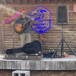 Haughty Heron - Zach Lambert playing some music on the outdoor stage