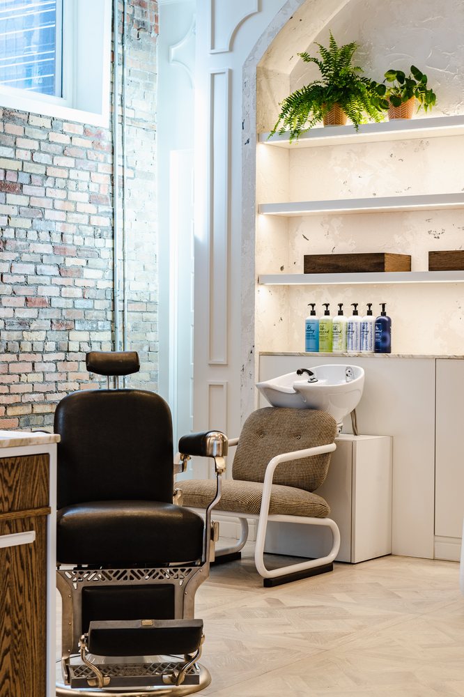 Johnny's Barber + Shop Logo