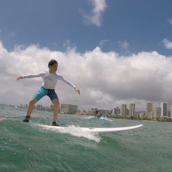 Ohana Surf Project - My 13 year old stands up on his first try thanks to Chelsea and the onshore training. Waikiki is in the background. - Surf Schools Near Me - Honolulu, Hawaii Ohana Surf Project - My 13 year old stands up on his first try thanks to Chelsea and the onshore training. Waikiki is in the background. - Surf Schools Near Me - Honolulu, Hawaii