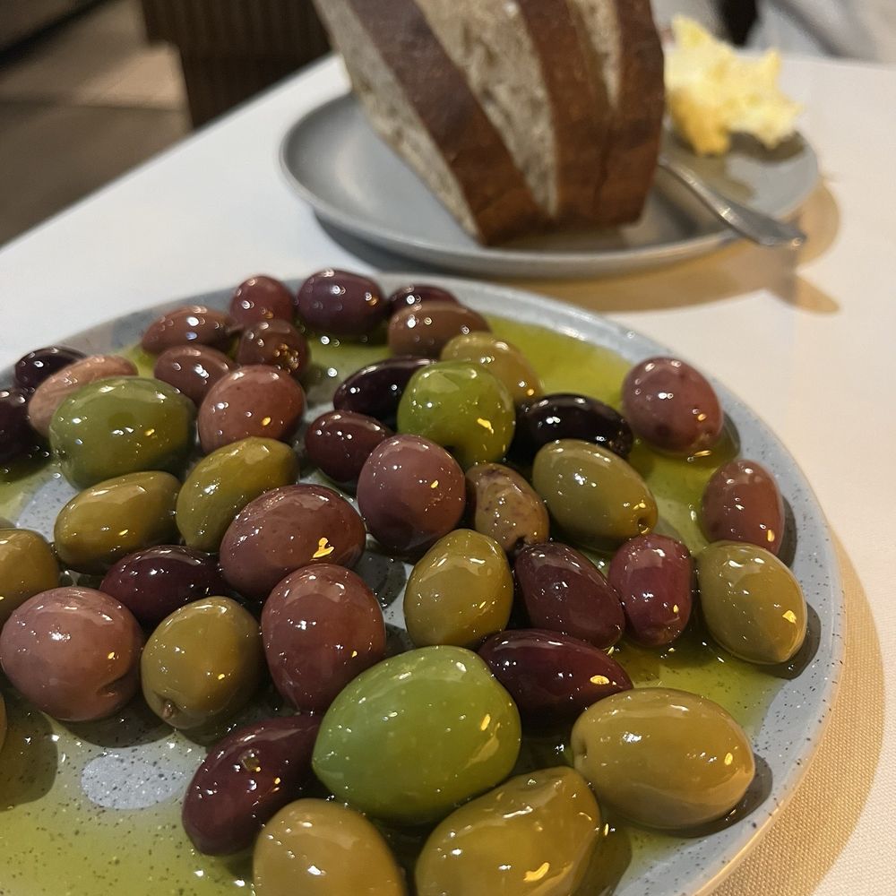 Entrecot - Olives and Sourdough Bread from the Tapas menu - Diners Near Me - Napa, California Entrecot - Olives and Sourdough Bread from the Tapas menu - Diners Near Me - Napa, California