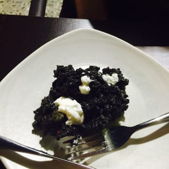 Carmela - Black rice/ arroz negro-- picture is not good but this dish is incredible flavorful and ultra yummy - Spanish Near Me - Granada, GR Carmela - Black rice/ arroz negro-- picture is not good but this dish is incredible flavorful and ultra yummy - Spanish Near Me - Granada, GR