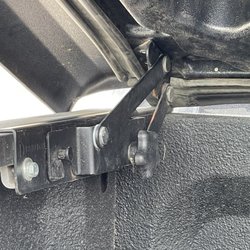 Fastrax - Left Hinge reriveted to hard cover