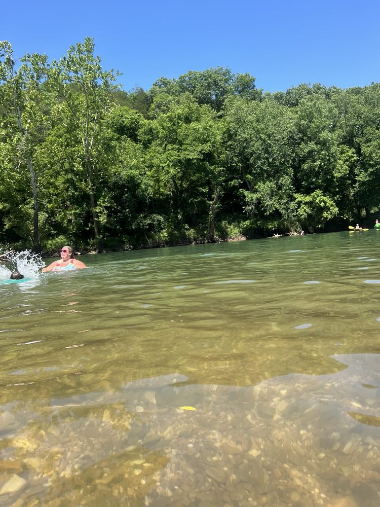 Camp Tomahawk Two-Mile Tube Float Logo