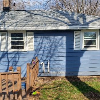 Wisconsin Windows - a blue house with white shutters - Windows Installation Near Me - Neenah, Wisconsin Wisconsin Windows - a blue house with white shutters - Windows Installation Near Me - Neenah, Wisconsin