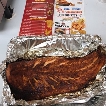 Mr. Fish & Chicken - a piece of meat in a foil pan - Fish & Chips Near Me - Lincoln Park, Michigan Mr. Fish & Chicken - a piece of meat in a foil pan - Fish & Chips Near Me - Lincoln Park, Michigan