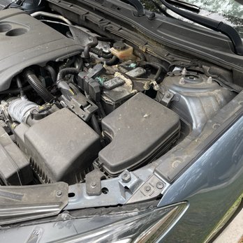Gunther Mazda - How can someone check the battery in this state of corrosion??? and not notice??? - Car Dealers Near Me - Fort Lauderdale, Florida Gunther Mazda - How can someone check the battery in this state of corrosion??? and not notice??? - Car Dealers Near Me - Fort Lauderdale, Florida