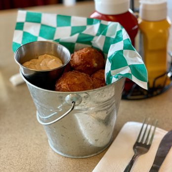 Palmer Hills Golf Course - Palmer Balls! With a side of horseradish dipping sauce. Little deep-fried potato balls...delicious! - Golf Near Me - Bettendorf, Iowa Palmer Hills Golf Course - Palmer Balls! With a side of horseradish dipping sauce. Little deep-fried potato balls...delicious! - Golf Near Me - Bettendorf, Iowa