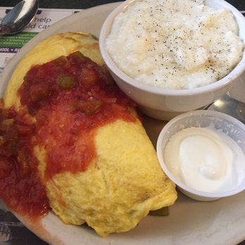 Metro Diner - Yummy omelet with best grits ever and a side of sour cream - Diners Near Me - Gainesville, Florida Metro Diner - Yummy omelet with best grits ever and a side of sour cream - Diners Near Me - Gainesville, Florida