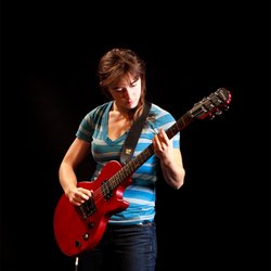 Suncho School of Music - Lilia jammin' on electric guitar