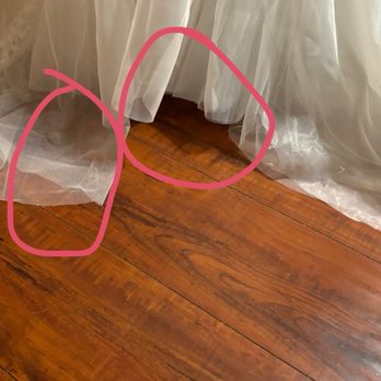 Illusion Bridal - This picture shows one side to short and right next to it a piece to long. To this she said it was perfect height and she wasn't done yet. - Sewing & Alterations Near Me - Whittier, California Illusion Bridal - This picture shows one side to short and right next to it a piece to long. To this she said it was perfect height and she wasn't done yet. - Sewing & Alterations Near Me - Whittier, California