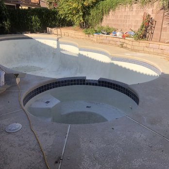 J Pool Service - New tile - deck is not painted yet - Pool Cleaners Near Me