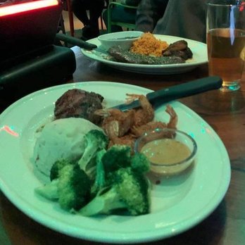 Bahama Breeze - Sirloin steak and coconut shrimp. At the back it the skirt steak with chimichurri. - Bars Near Me - Woodbridge, New Jersey Bahama Breeze - Sirloin steak and coconut shrimp. At the back it the skirt steak with chimichurri. - Bars Near Me - Woodbridge, New Jersey