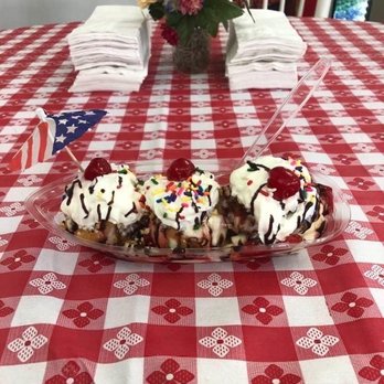 Uncle Bart's Ice Cream & More - a banana split on a table - Ice Cream & Frozen Yogurt Near Me - Lincolnton, Georgia Uncle Bart's Ice Cream & More - a banana split on a table - Ice Cream & Frozen Yogurt Near Me - Lincolnton, Georgia