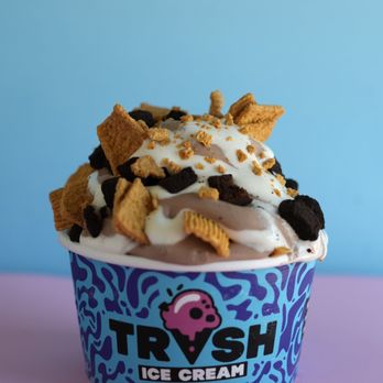 Trash Ice Cream - #4: I Think We're Alone Now: chocolate ice cream mixed with Golden Grahams cereal, chocolate brownies and gooey marshmallow topping. - Ice Cream & Frozen Yogurt Near Me - Bentonville, Arkansas