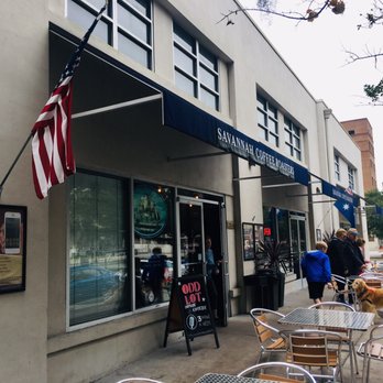 Savannah Coffee Roasters - Exterior. Inside there is a cozy seating area with a real fire and a back room roastery. - Coffee & Tea Near Me - Savannah, Georgia