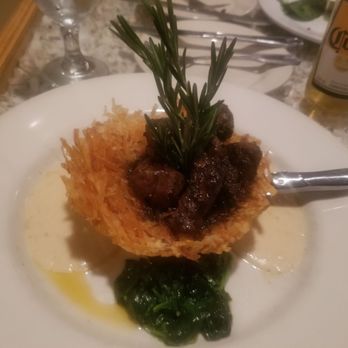Catch 22 - Beef tips on nest of potatoes, spinach. - Seafood Near Me - Hilton Head Island, South Carolina