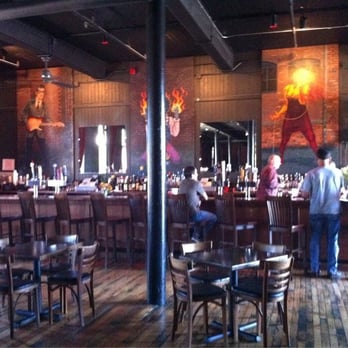 The Met - people sitting at the bar in a restaurant - Music Venues Near Me - Pawtucket, Rhode Island