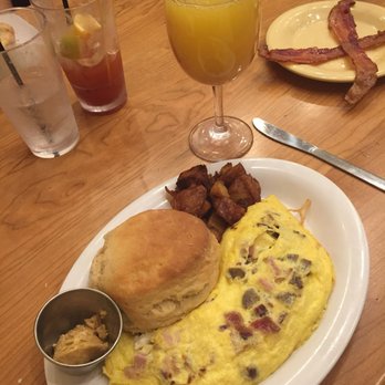 Ruby Slipper Decatur - Omelette with sausage, bacon and goat cheese - Breakfast & Brunch Near Me - New Orleans, Louisiana Ruby Slipper Decatur - Omelette with sausage, bacon and goat cheese - Breakfast & Brunch Near Me - New Orleans, Louisiana