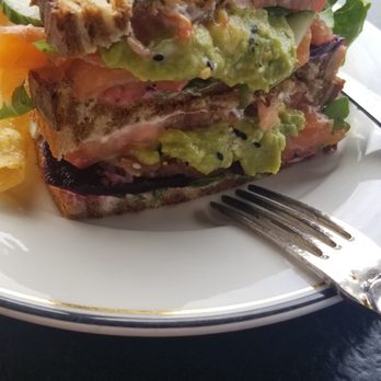 Supper - Side view of salmon sandwich - New American Near Me - San Antonio, Texas