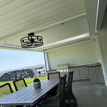 LB Built - Outdoor louvered pergola that opens and closes, with an outdoor kitchen - General Contractors Near Me