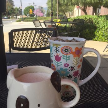 Rail Side Cafe - Chai Latte in the puppy mug and coconut cream in the flower mug...how cute! - Coffee & Tea Near Me - San Dimas, California Rail Side Cafe - Chai Latte in the puppy mug and coconut cream in the flower mug...how cute! - Coffee & Tea Near Me - San Dimas, California