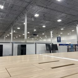 Best Buy - Good luck finding anything.
