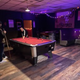 a man playing pool