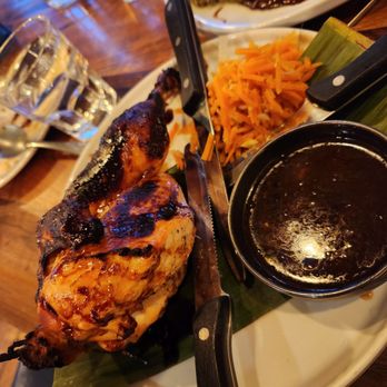 Magna Kusina - The chicken our waiter tore apart with his bare hands... - Filipino Near Me - Portland, Oregon Magna Kusina - The chicken our waiter tore apart with his bare hands... - Filipino Near Me - Portland, Oregon