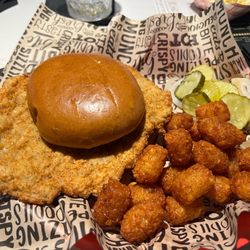 Mile Post 42 - Yeah this is a pork tenderloin sandwich. Worth going back for. So amazing. And say hi to Austin the bartender. He's awesome