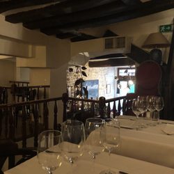 Le Perron - The empty spot where I ate by myself while lively patrons dined below