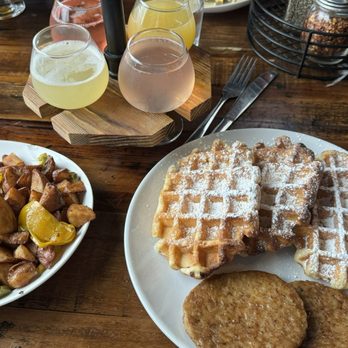 Pies on Post - Belgian waffles with sausage patties, and home fried potatoes - Italian Near Me - Cumming, Georgia