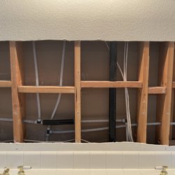 Leak Finders - Repipe spare bath behind the mirror