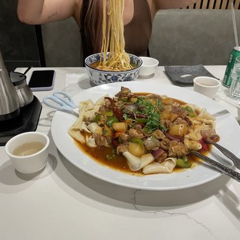 Highland Noodles - Size reference photo with big plate chicken, tea cup, and small bowl of Lanzhou noodles. - Noodles Near Me - Milpitas, California