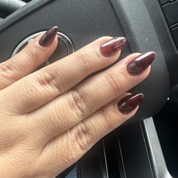 Gel x nails with a tortoiseshell design. Gel x nails with a tortoiseshell design.