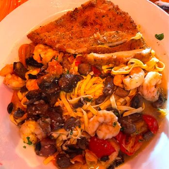 The Refuge - "Fettuccini DeVinci" shrimp, mushrooms and peppers over fettuccini and added breaded chicken cutlet - about $33 - Latin American Near Me - Melville, New York