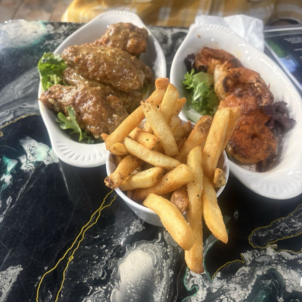 Southern Comfort Restaurant - Wings W/ Fries and grilled shrimp (the wings and shrimp were apart of a special. They were both $1 but the minimum was 5). - Southern Near Me - Hampton, Virginia Southern Comfort Restaurant - Wings W/ Fries and grilled shrimp (the wings and shrimp were apart of a special. They were both $1 but the minimum was 5). - Southern Near Me - Hampton, Virginia