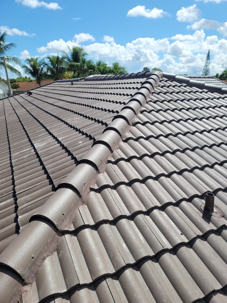 Slide of JMR Roofing Services