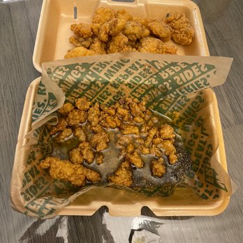 Wingstop - two trays of fried food on a table - Chicken Wings Near Me - Sterling Heights, Michigan Wingstop - two trays of fried food on a table - Chicken Wings Near Me - Sterling Heights, Michigan